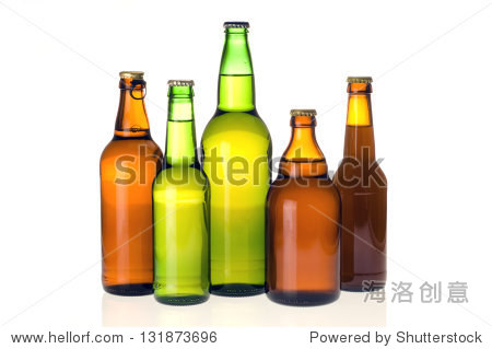 five different bottles of beer without labels isolated on white.