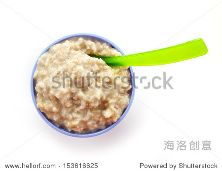 碗燕麦粥在白色的背景。婴儿食品 - 食品及饮料