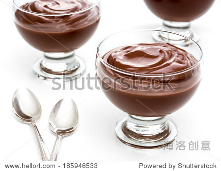 chocolate pudding on white table. shallow dof.