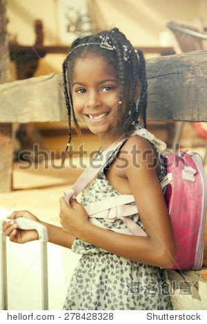 african american little girl with backpack back to school