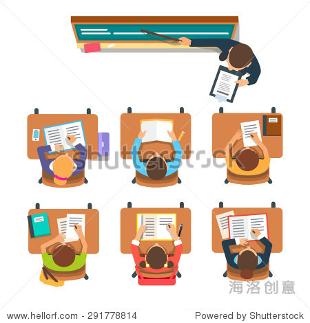 teacher standing and pointing at the chalkboard teaching in