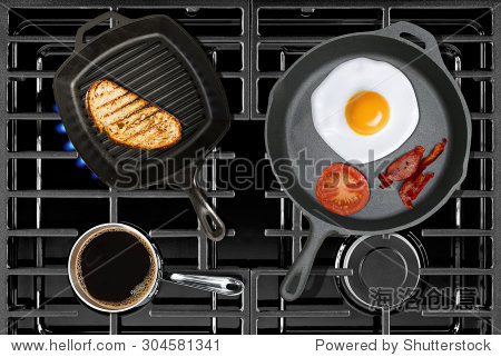 close-up of cooking continental breakfast on stove top view
