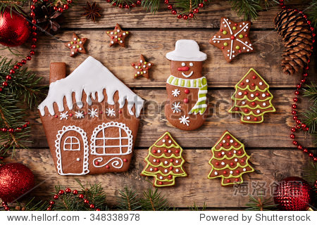 gingerbread house fur trees stars and snowman cookies christmas