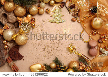 christmas composition of decorations in gold tones: tree pine