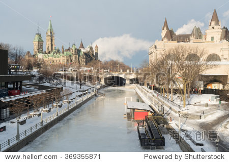 ottawa rideau canal skateway in winter with parliament hill and