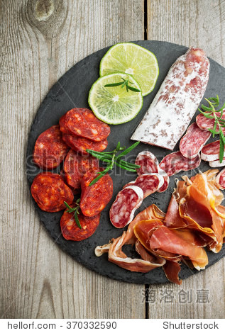assortment of spanish tapas or italian antipasti jamon