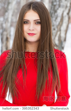 young girl in a red dress with long hair