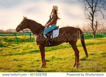 beautiful sensuality elegance woman cowgirl, riding a horse.