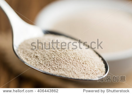 portion of dried yeast(close-up shot on wooden background