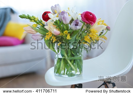 a bouquet of fresh flowers in a glass vase.