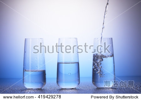 with reflection in drops of water on white and blue background
