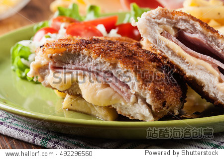 cutlet cordon bleu with pork loin served with french fries and