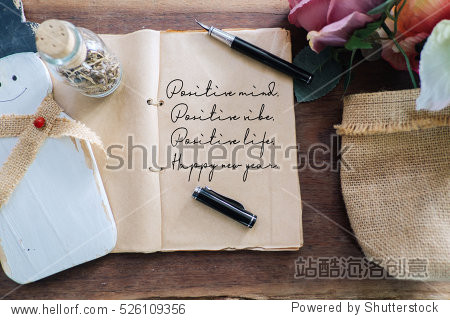 " .pen and snowman bouquet roses on the wooden background.