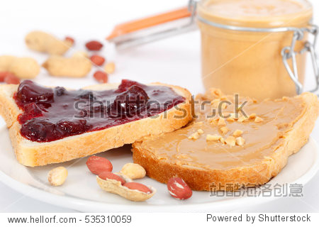 bread toast with peanut butter and jelly jam on white plate