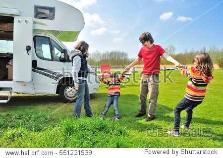 (camper) travel with kids happy parents with children on holiday