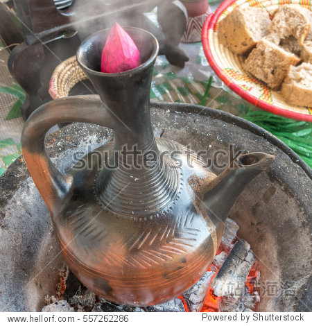 brewing traditional ethiopian coffee with jebena usi