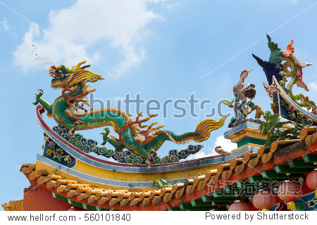 chinese dragon phoenix and crane on taoist temple tiled roof