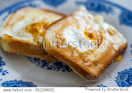 golden <strong>french</strong> toast with butter and egg. breakfast with bread.