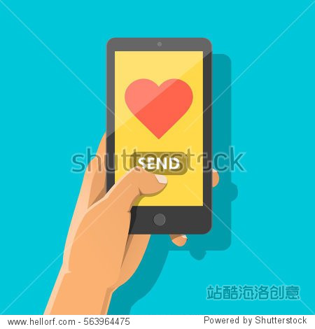 sending love message concept. hand holding phone