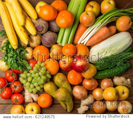 group fruits and vegetables on a wooden rustic table top view