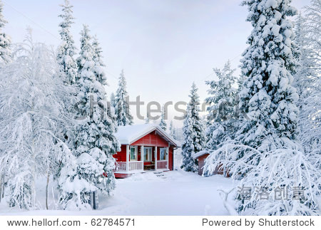 winters tale. red finnish cottage in a beautiful snow forest.