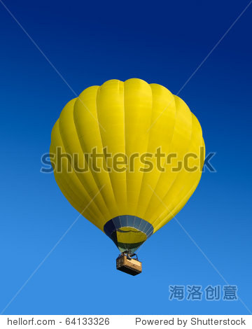 yellow hot air balloon flying on dark blue sky background
