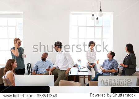 young business group in discussion in their office