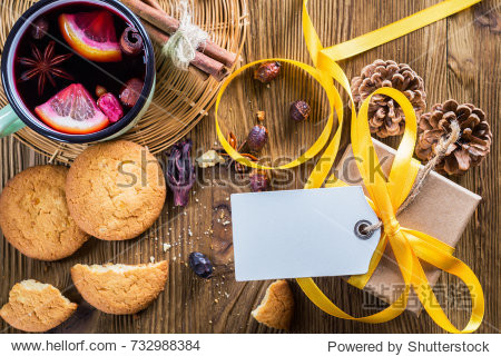 christmas gift boxes with a blank label and hot fruit tea with