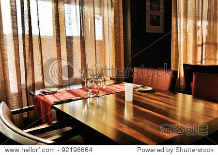luxury hotel living room interior with brown furniture and large
