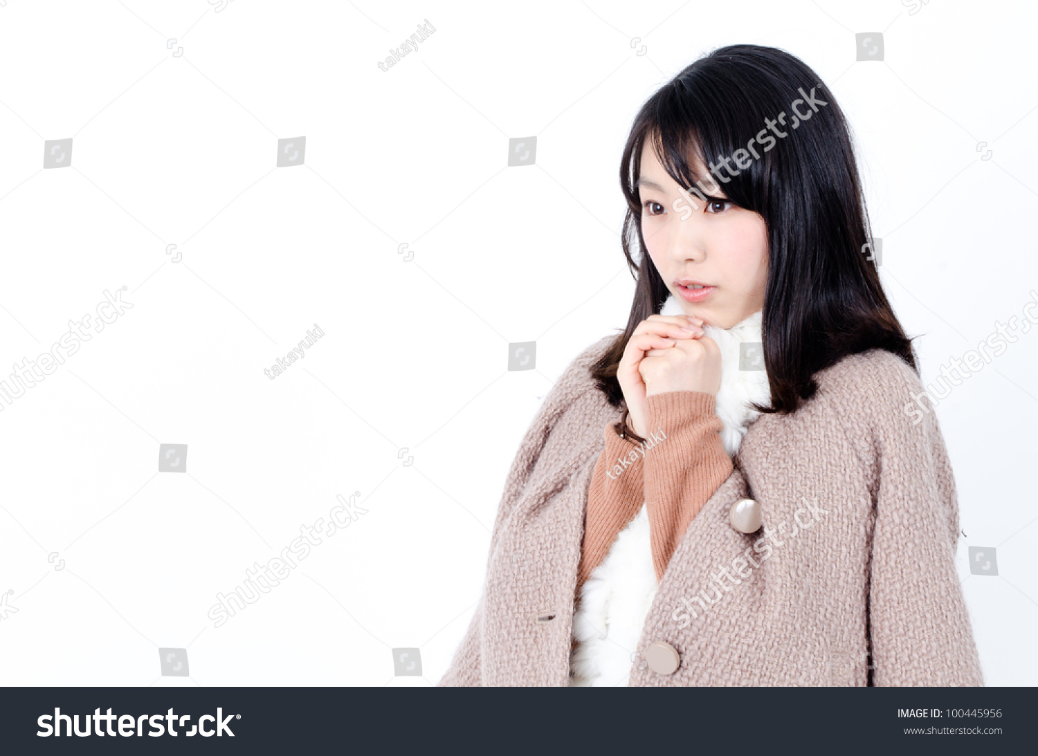 attractive asian woman wearing a coat