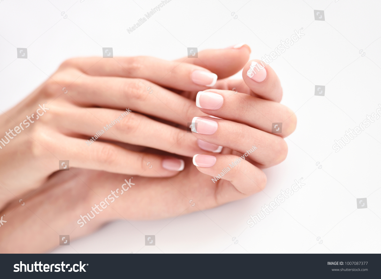 Beautiful woman hands with french manicure
