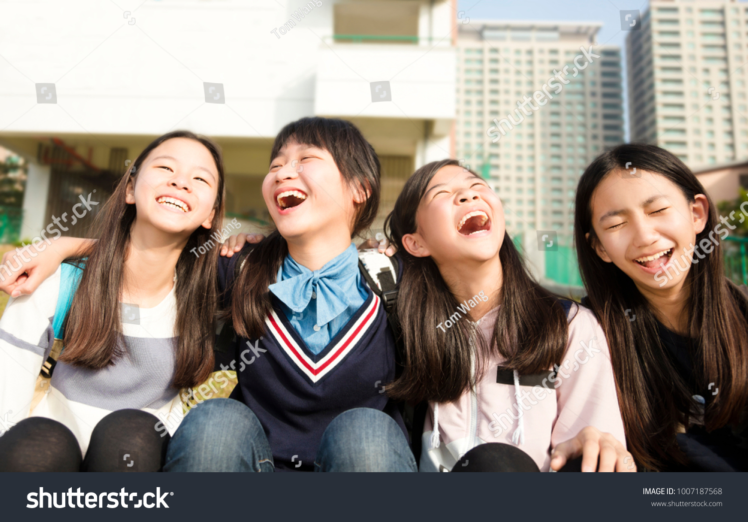 Group Of Teenage Students girls having fun