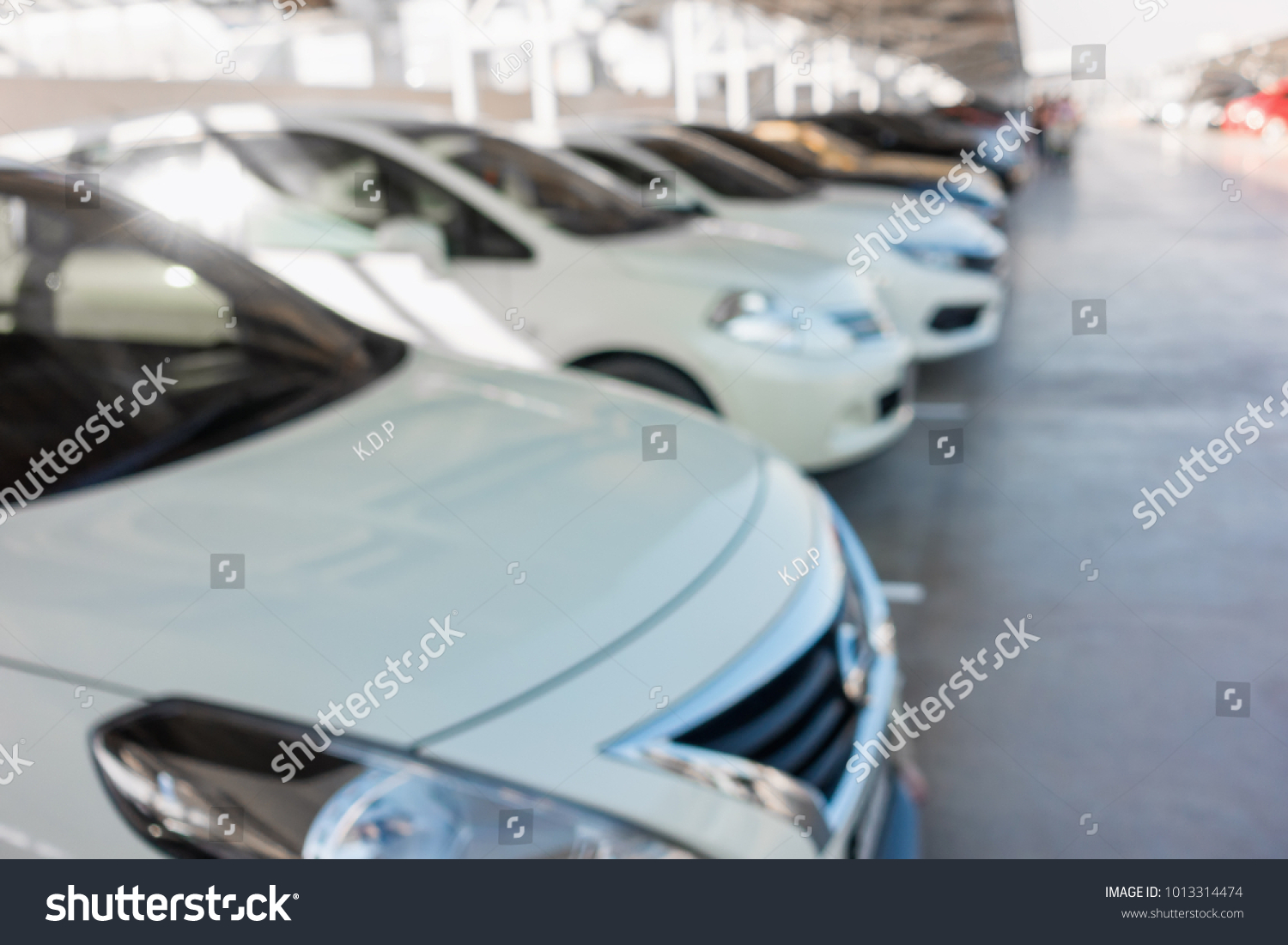 Abstract blurred of car parking lot in department store.