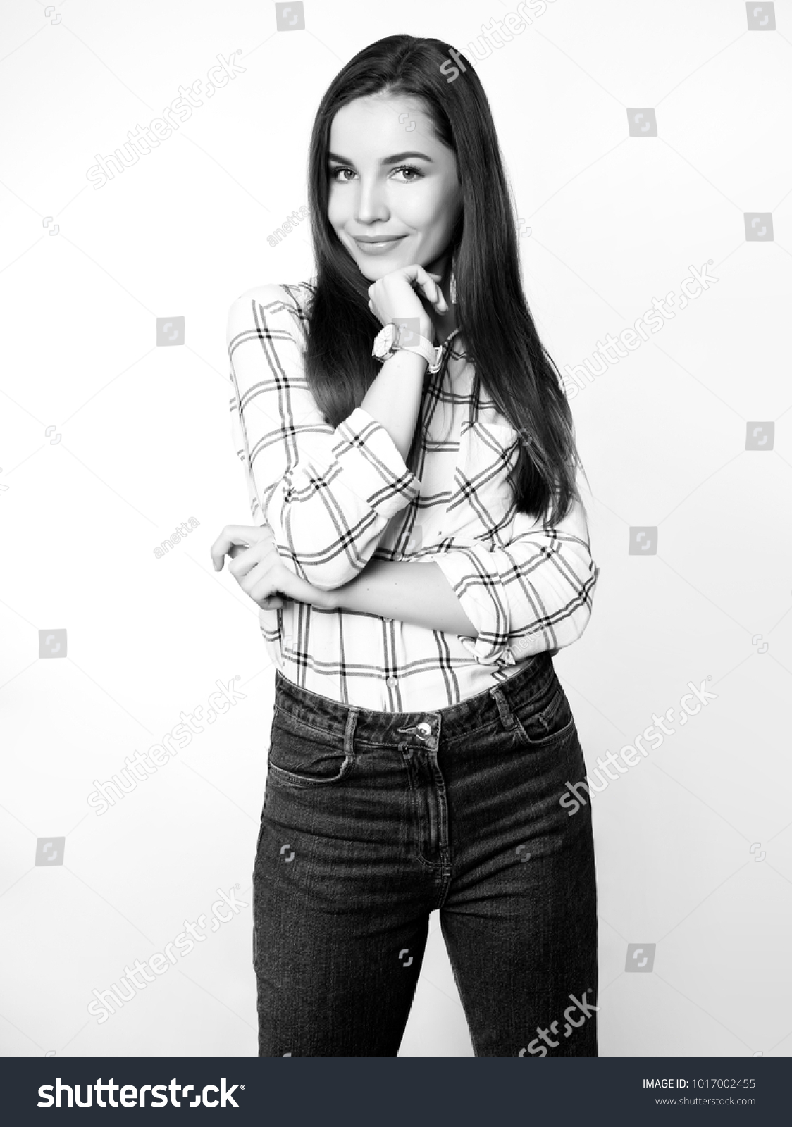 beautiful young woman with long hair wearing wrist watch
