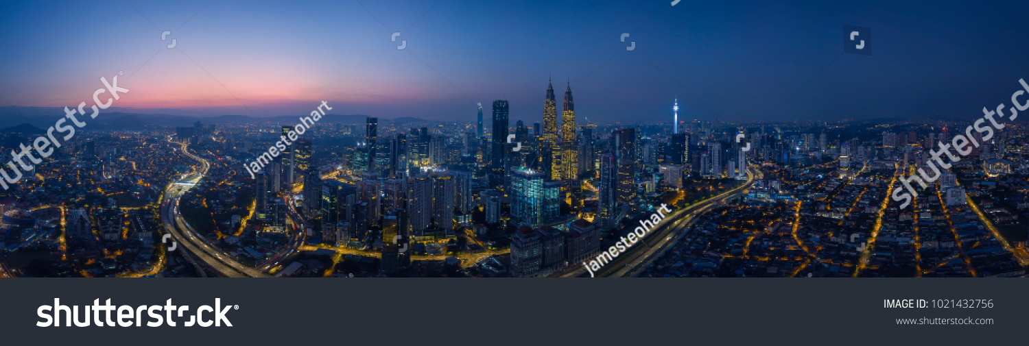Panorama aerial view in the middle of Kuala Lumpur cityscape skyline .Night scene before sunrise Malaysia .