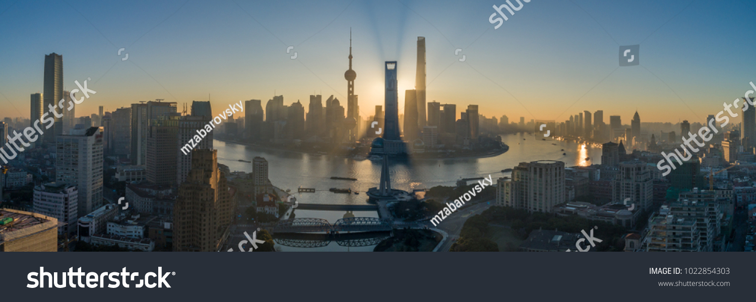 Shanghai Skyline and Huangpu River at Sunrise. Lujiazui District. Panoramic Aerial View.