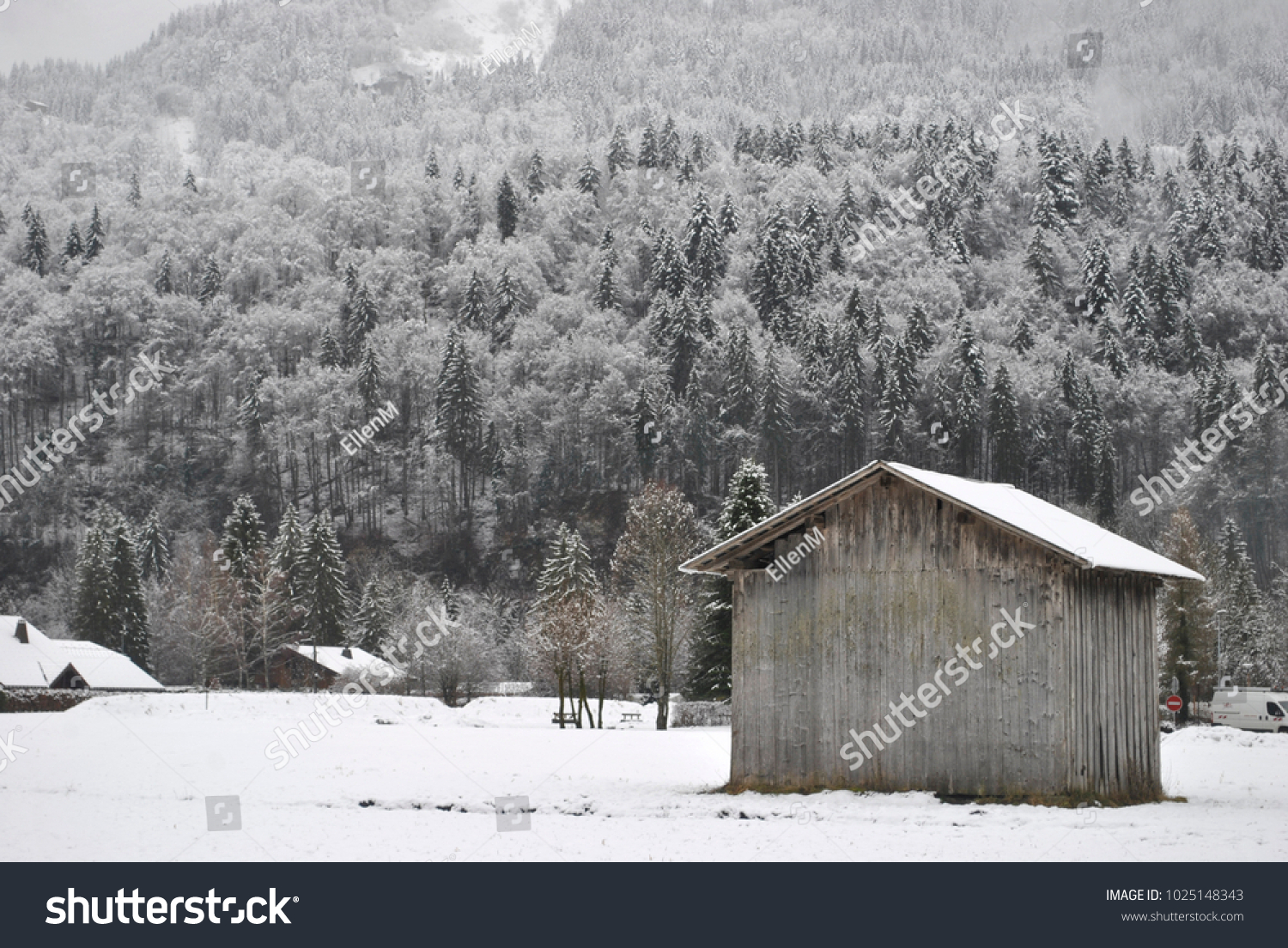 small wooden house and a beautiful winter forest France village Samoens