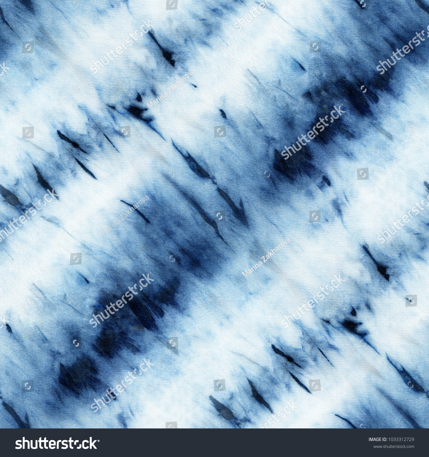 Seamless tie-dye pattern of indigo color on white silk. Hand painting fabrics - nodular batik. Shibori dyeing. 