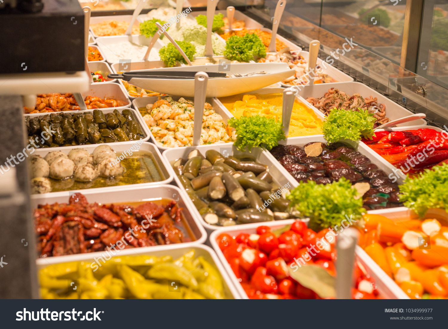 vegetables on a street market decorated with green salad in