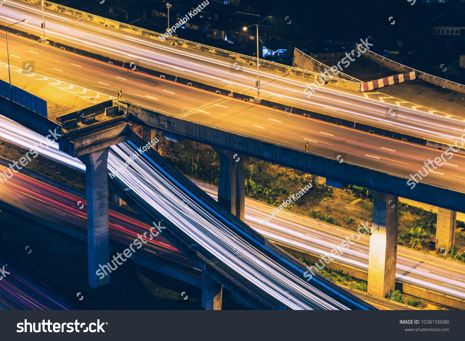 Light trails on express highway at night  long exposure abstract urban background