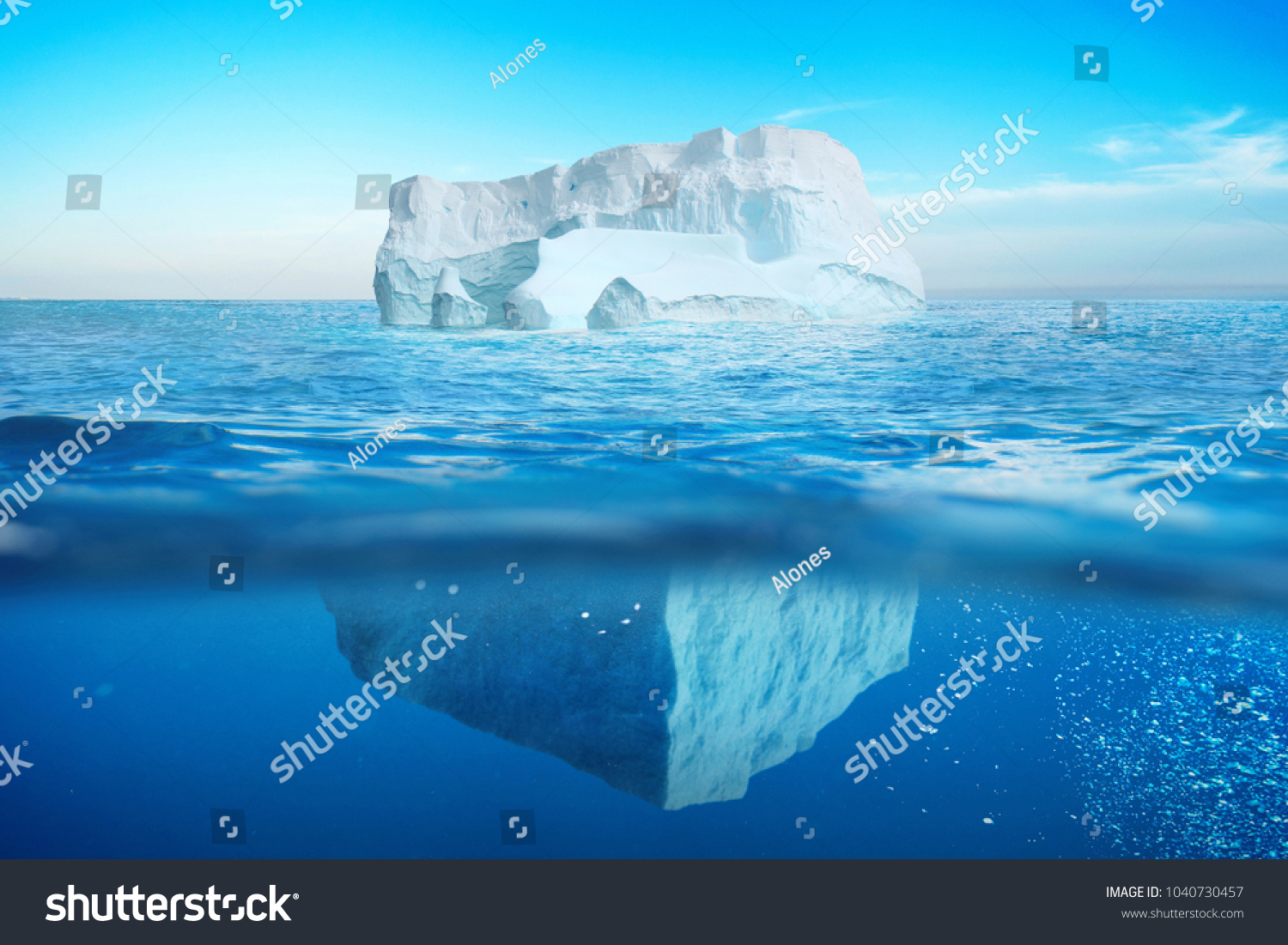 Underwater view of iceberg with beautiful transparent sea. Hidden Danger And Global Warming Concept