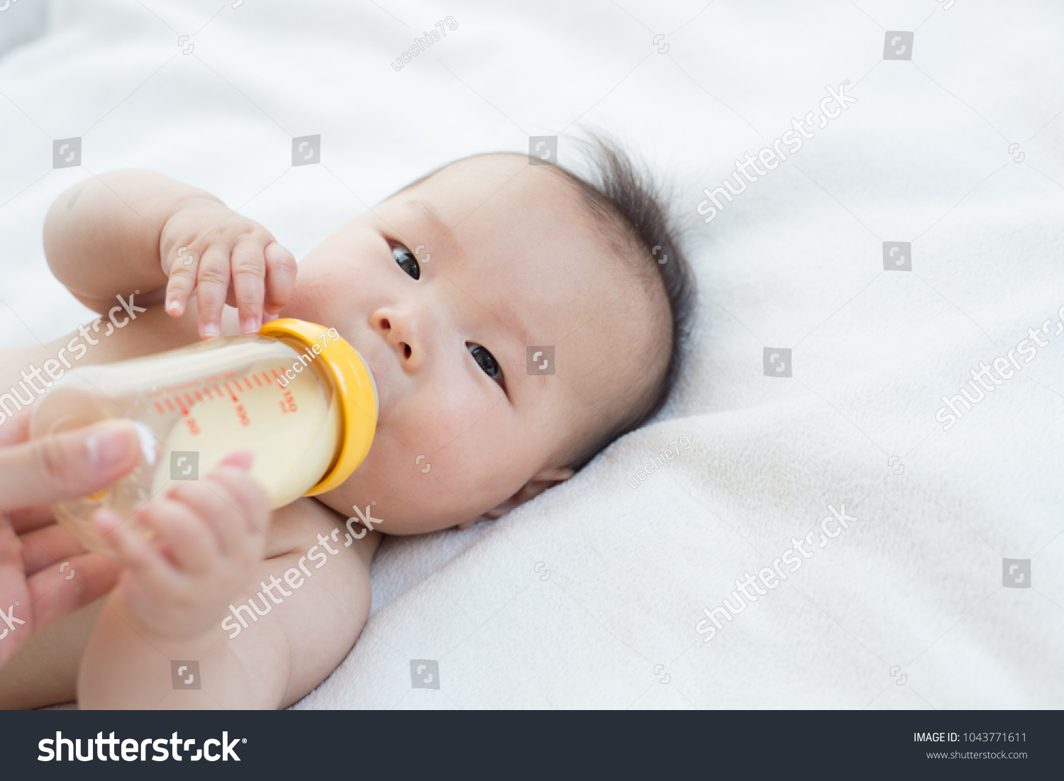 beautiful japanese baby drinking