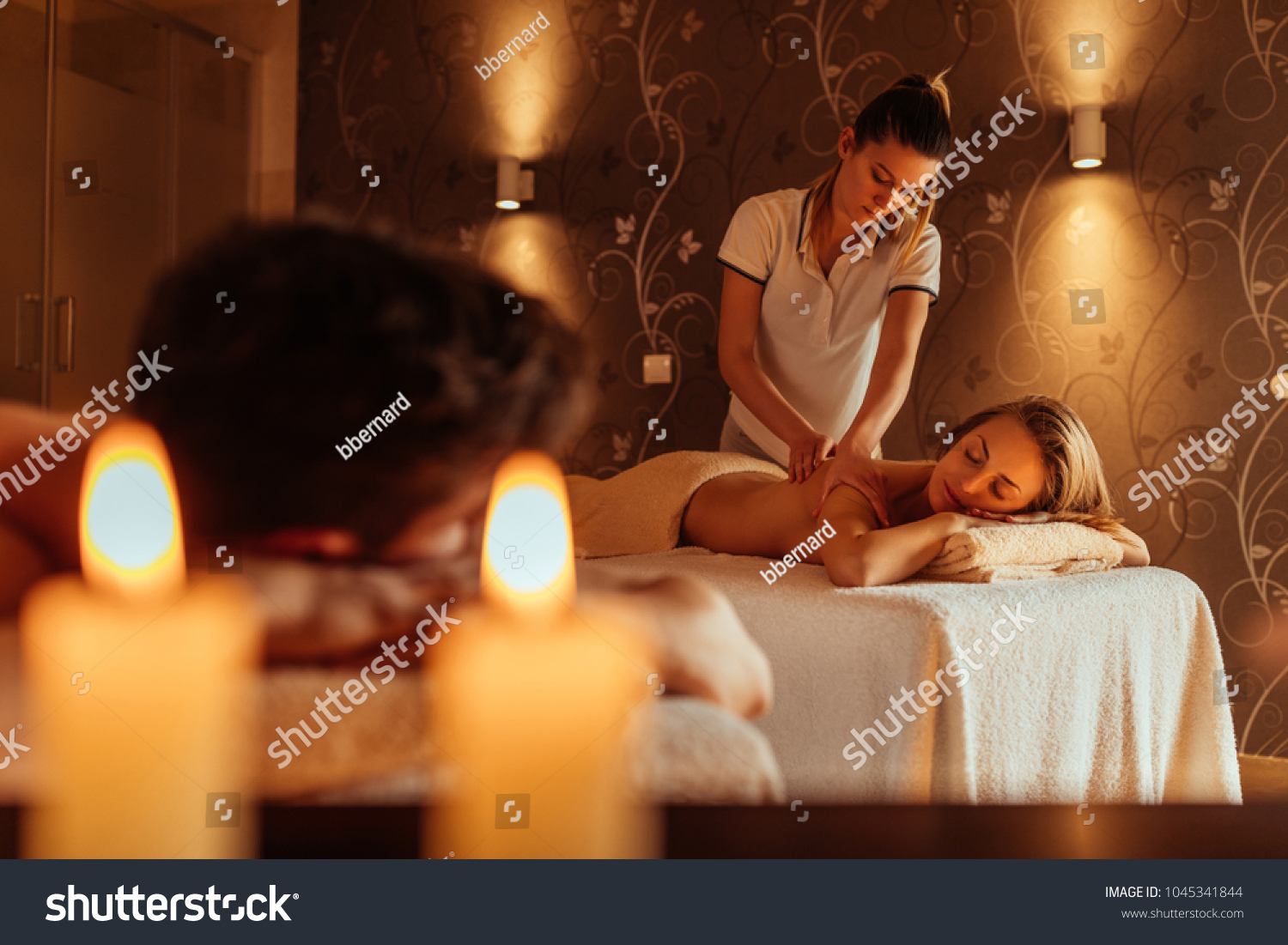 Cropped shot of a young couple getting a romantic massage