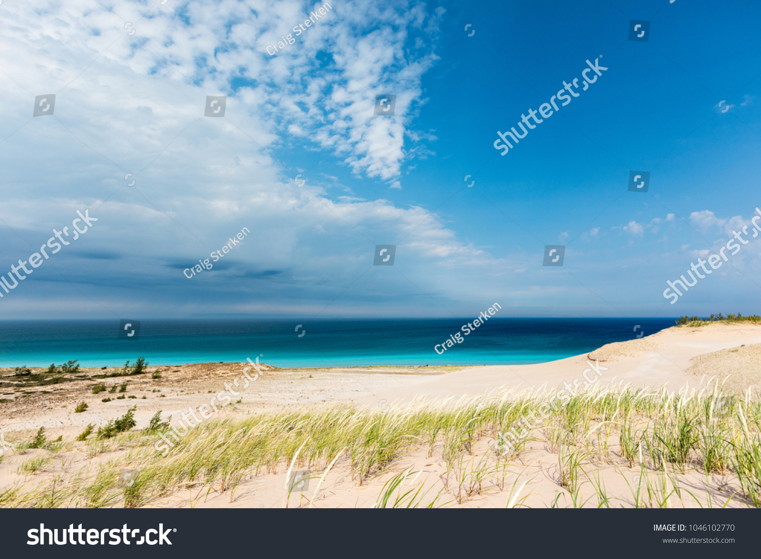 Azure blue skys and the waters of Lake Michigan are the background at Sleeping Bear Dunes National Lakeshore in Glen Haven Michigan