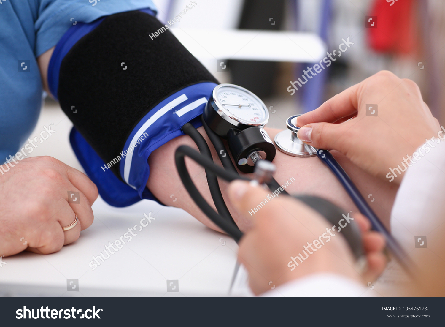 Female doctor arms make medic procedure closeup. Physical cure arterial beat exam tool nurse control and consult healthy lifestyle diagnosis therapeutist practice heal problem reception concept