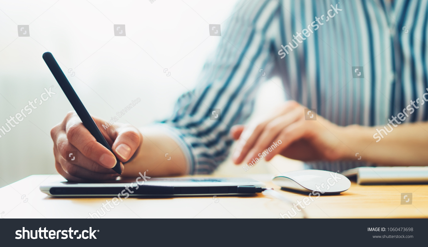 graphic designer working office with digital stylus on background monitor computer hipster manager using device pen female hands close up graw on portable tablet work process concept in workplace