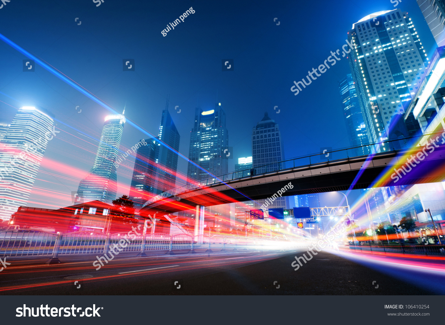 the light trails on the modern building background in shanghai china.
