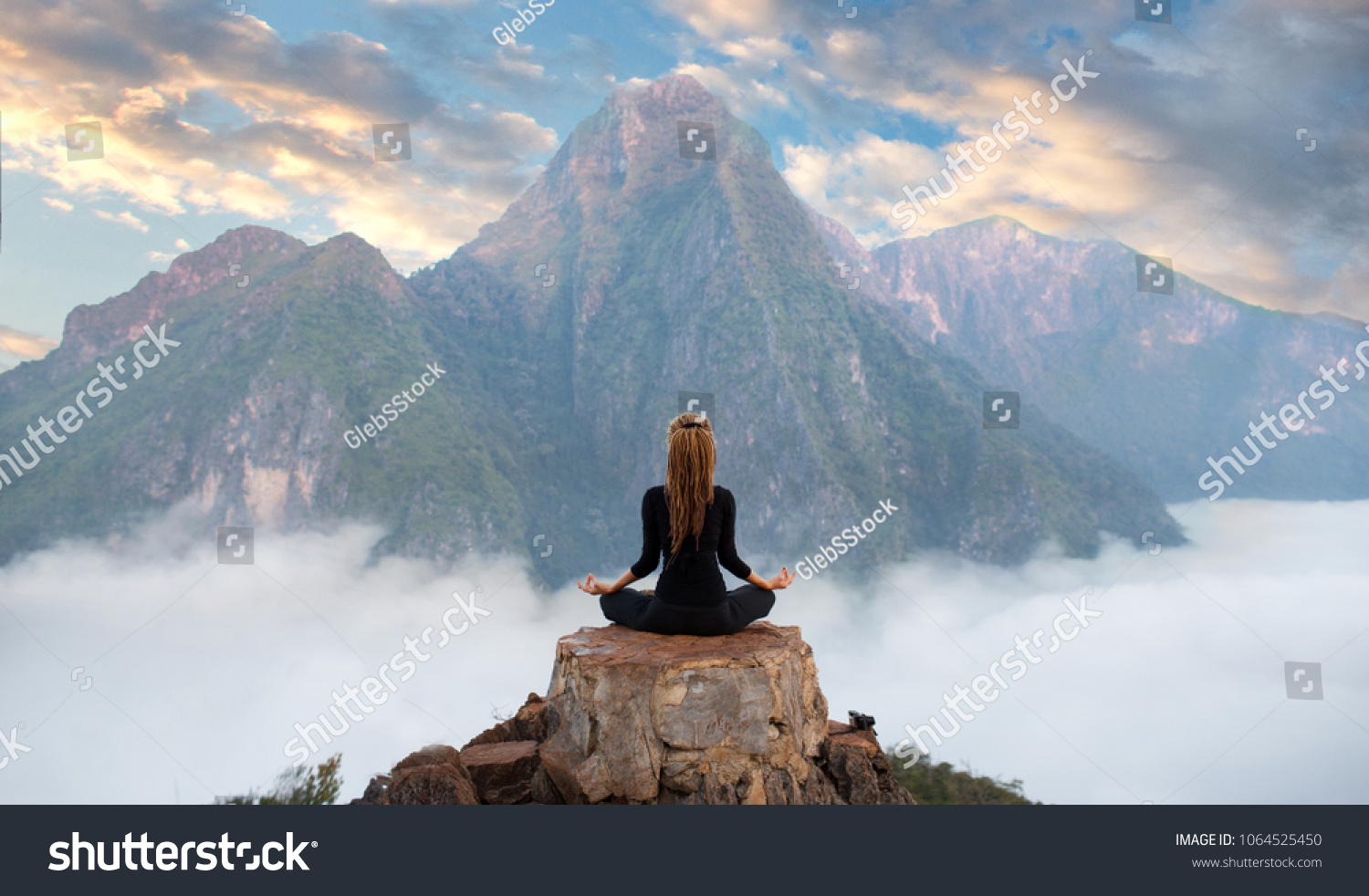Serenity and yoga practicing at mountain range meditation 