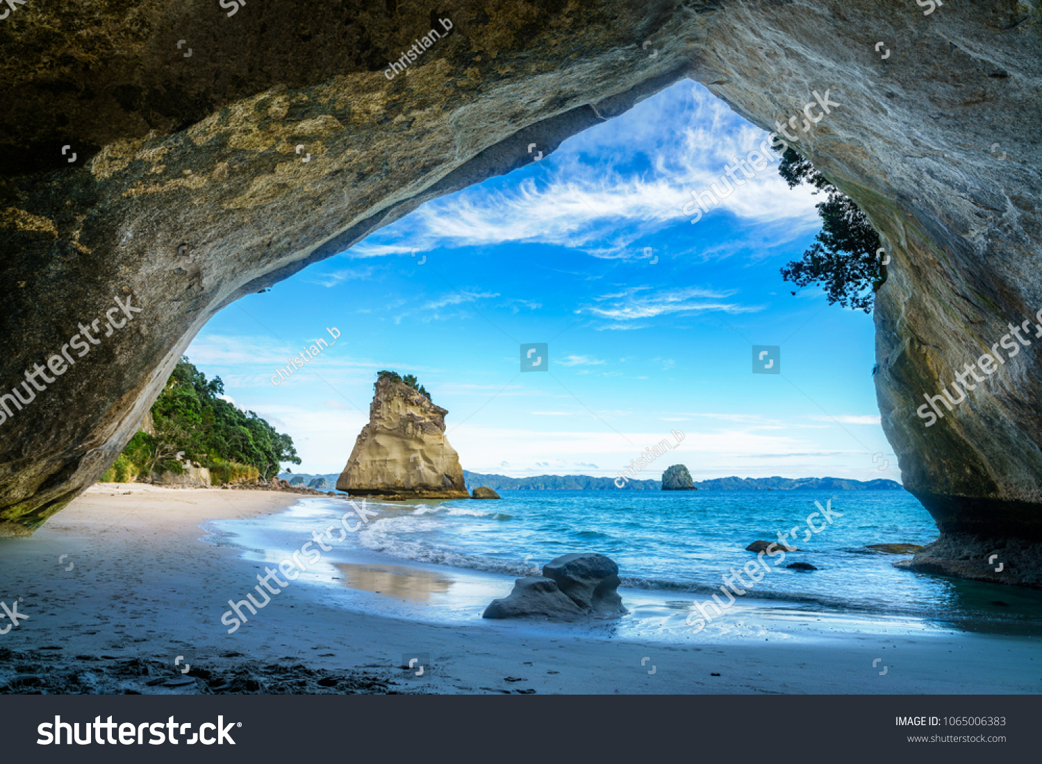 view from the cave at cathedral cove beach coromandel new zealand