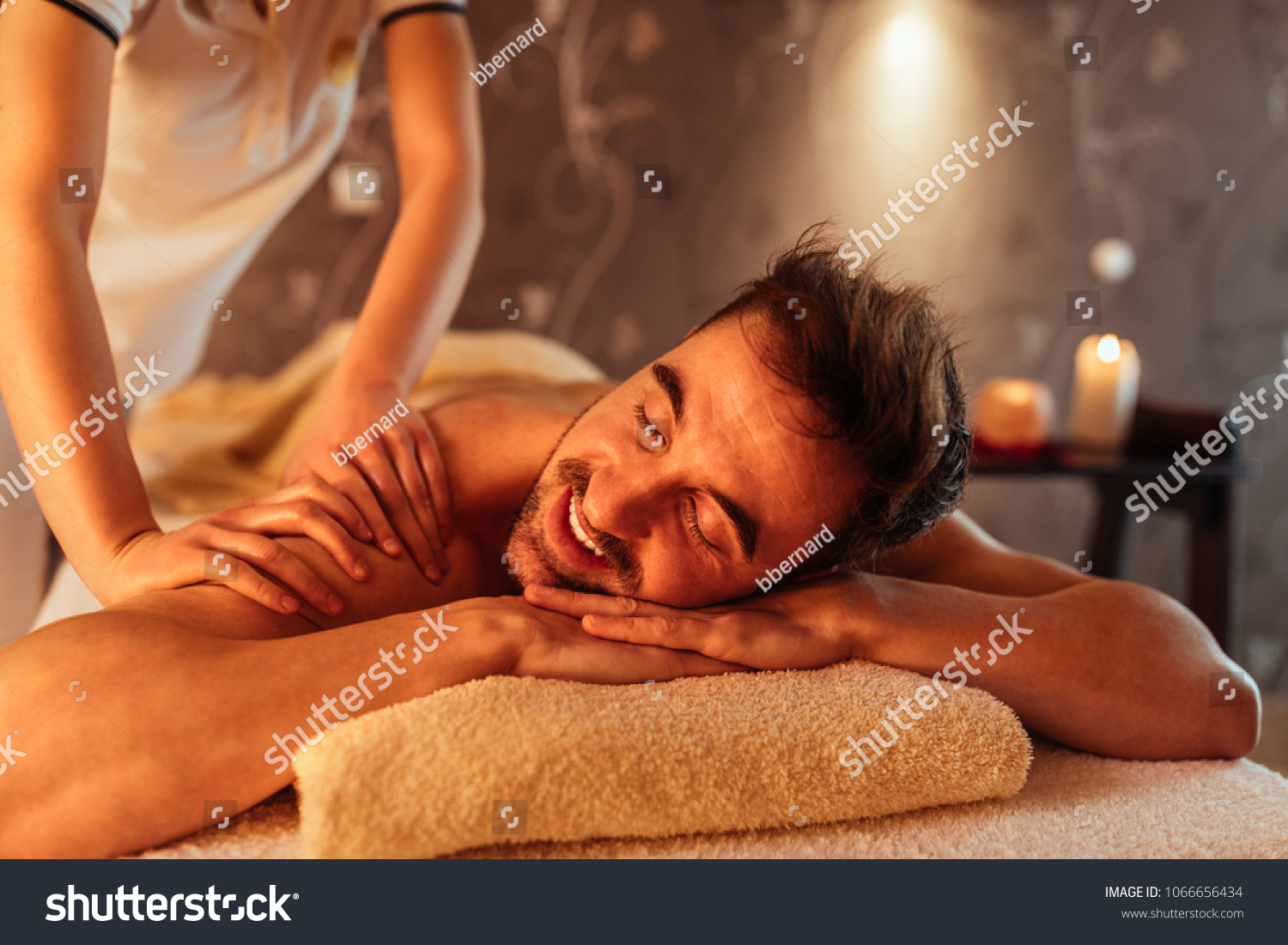 Young man enjoying a massage at a spa